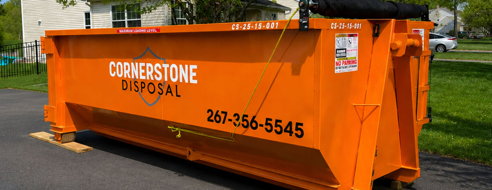 Cornerstone Disposal roll-off dumpster delivered to a driveway in Bucks County, PA